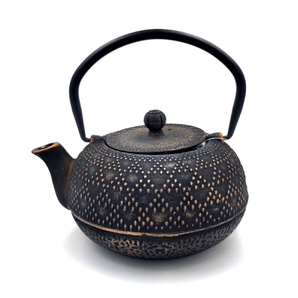 Tetera de hierro fundido.